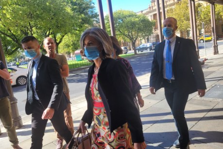‘Absolute disgrace’: Anti-vaxxers heckle Spurrier after court ruling