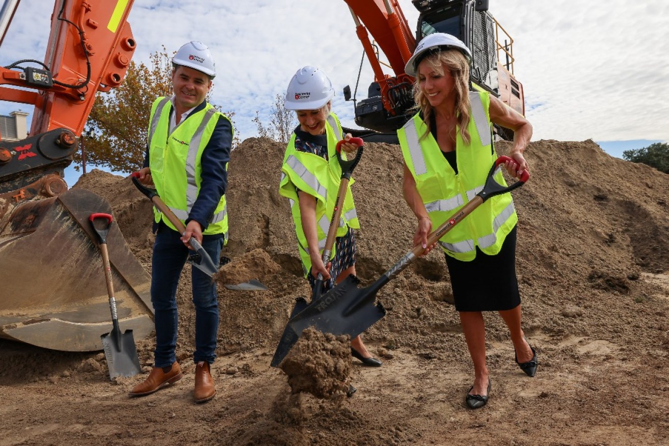 Commercial & General executive chairman Jamie McClurg with Lord Mayor Sandy Verschoor (middle) at a sod-turning ceremony for Eighty Eight O'Connell in April. Photo: Tony Lewis/InDaily