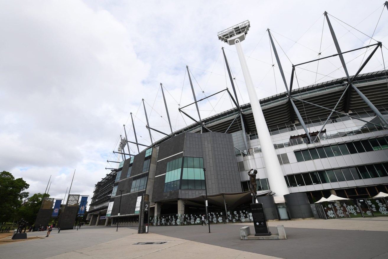 The first AFL Grand Final at the MCG for three years will stay in the traditional afternoon timeslot. Photo: AAP/James Ross