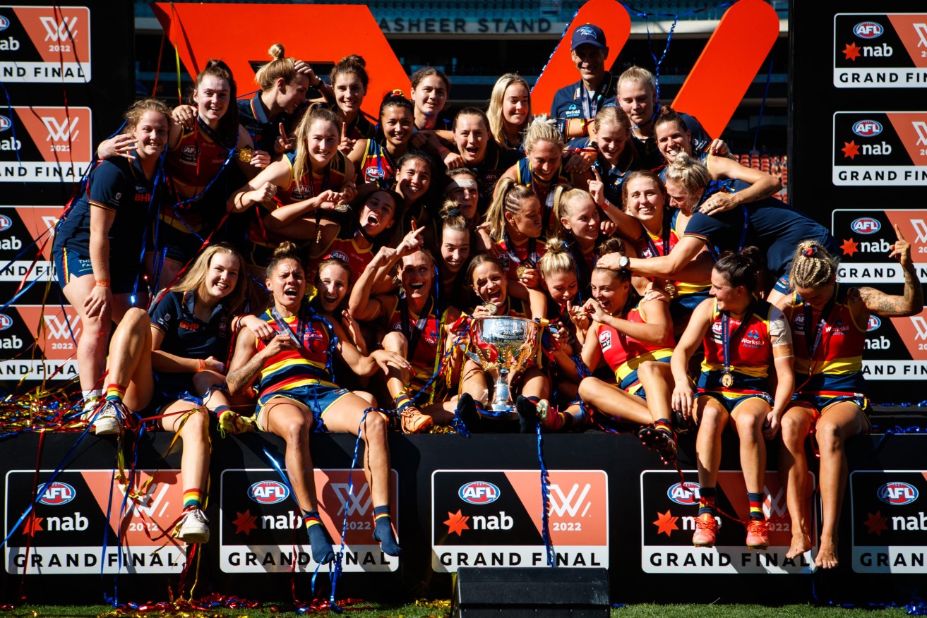 The Crows celebrate their AFLW Grand Final win against Melbourne at Adelaide Oval in April. Photo: AAP/Matt Turner