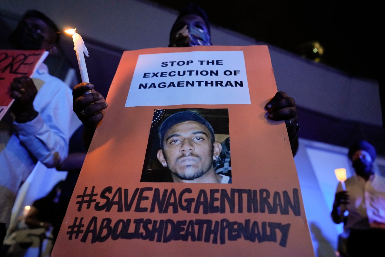 A protest against Singapore's execution of Nagaenthran Kharmalingam. Photo: AP/Vincent Thian