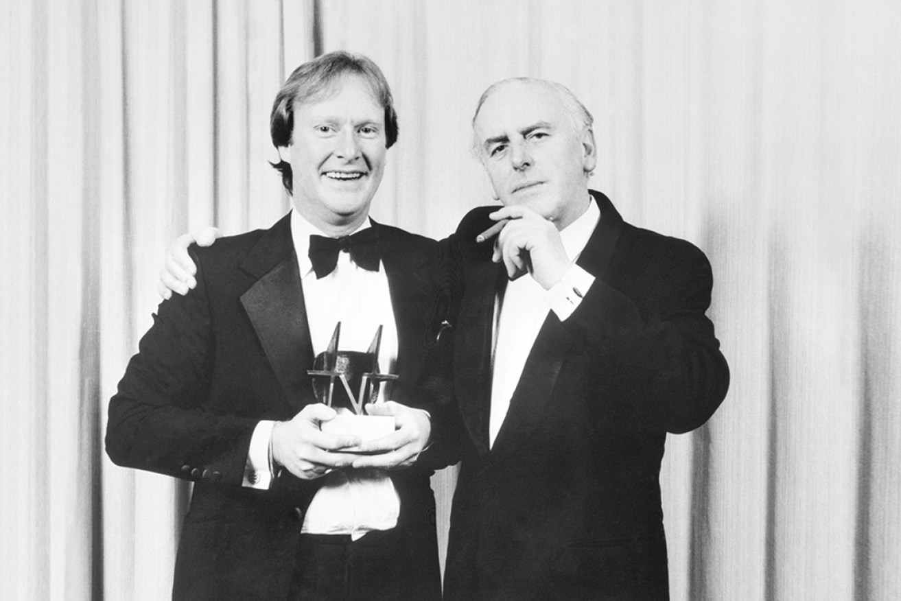 Dennis Waterman (left) with fellow Minder star George Cole in 1985. Photo: PA/PA Wire