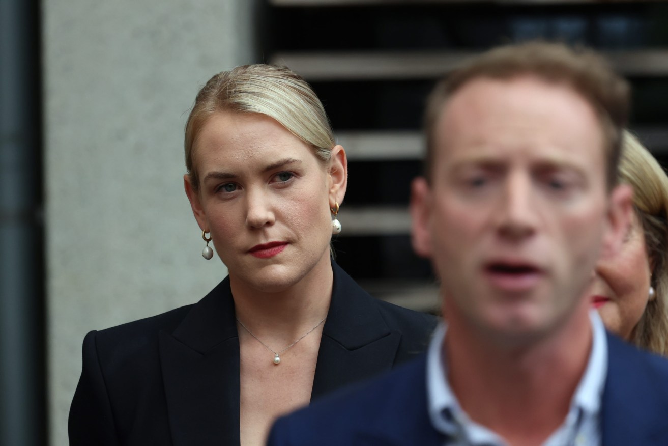 Liberal frontbencher Ashton Hurn finds a helpful position to offer counsel to her parliamentary leader. Photo: Tony Lewis / InDaily