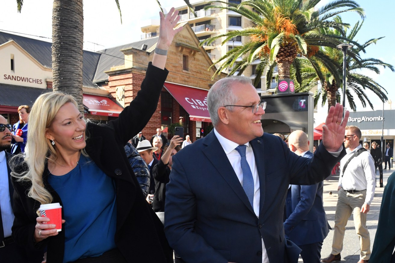 Liberal candidate for Boothby Dr Rachel Swift and Prime Minister Scott Morrison at Glenelg. Picture: Mick Tsikas/AAP