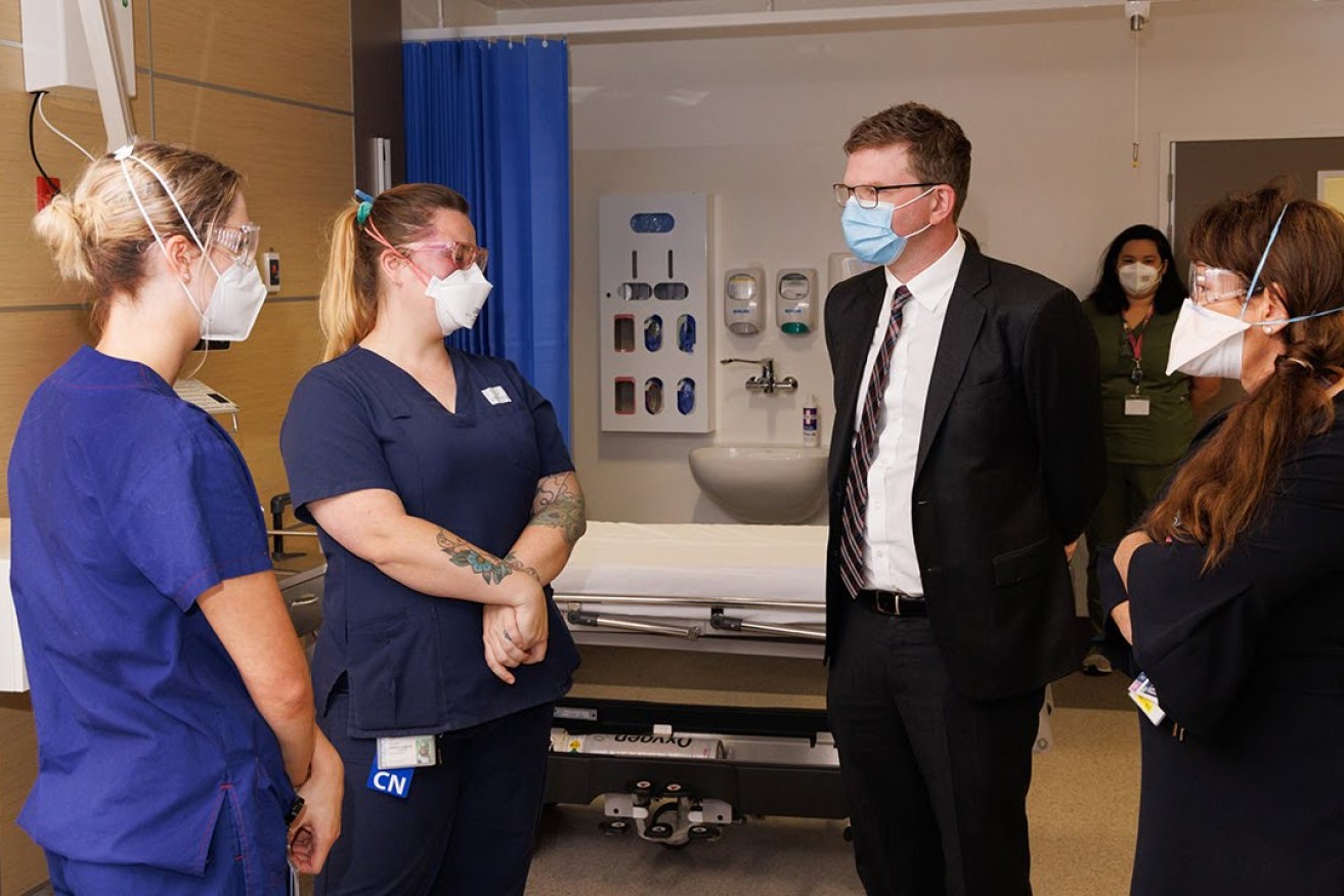 Chris Picton with nurses at the Royal Adelaide Hospital. Photo: Tony Lewis/InDaily
