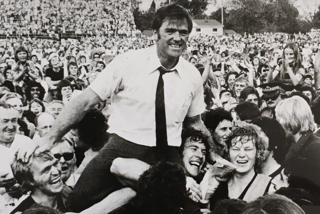 Neil Kerley is chaired from the ground after coaching Glenelg to its drought-breaking 1973 Grand Final win against North Adelaide. Photo: SANFL