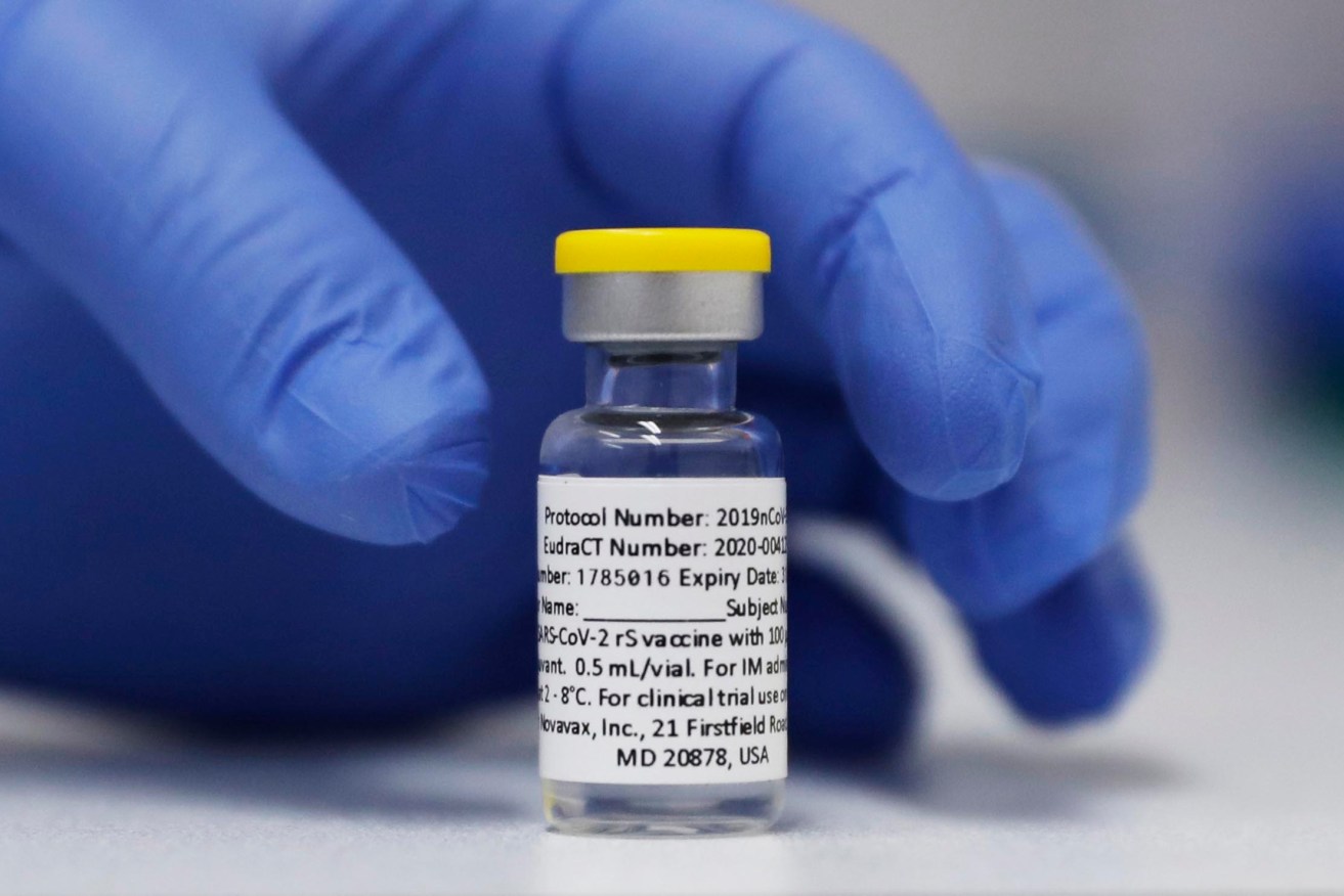 A vial of the Phase 3 Novavax coronavirus vaccine prepared for use in a trial at St. George's University hospital in London. Photo: AP/Alastair Grant