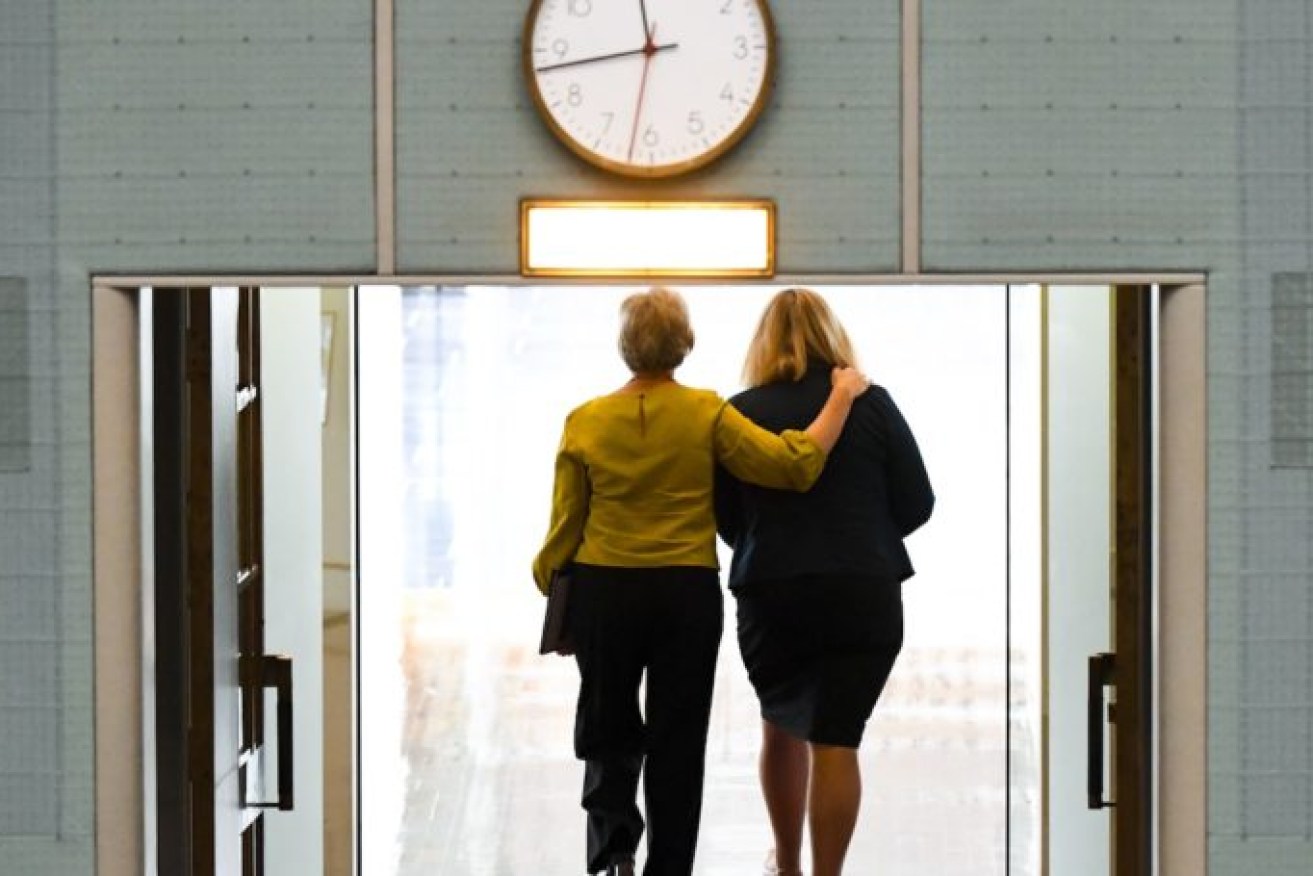 Independent MP Helen Haines and Liberal MP Bridget Archer leave the chamber after crossing the floor during a division on allowing debate on an integrity commission at Parliament House in Canberra last November. Photo: AAP/Lukas Coch