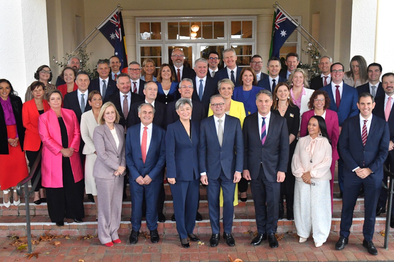 Prime Minister Anthony Albanese and his ministers after this morning's swearing-in ceremony at Government House in Canberra.
Photo: Mick Tsikas/AAP