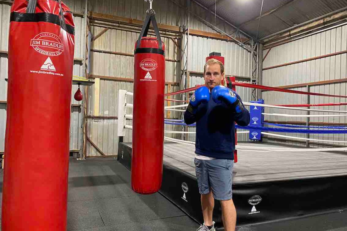 Ken Smoglian in the boxing ring of his Island Fitness gym.