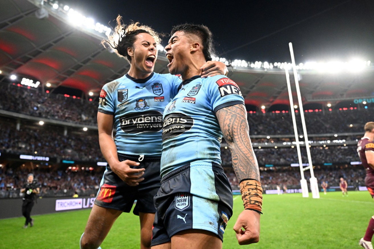 Jarome Luai (L) of the Blues celebrates after a Brian To’o try during during Game 2 of the 2022 State of Origin series. Photo: Dave Hunt/AAP