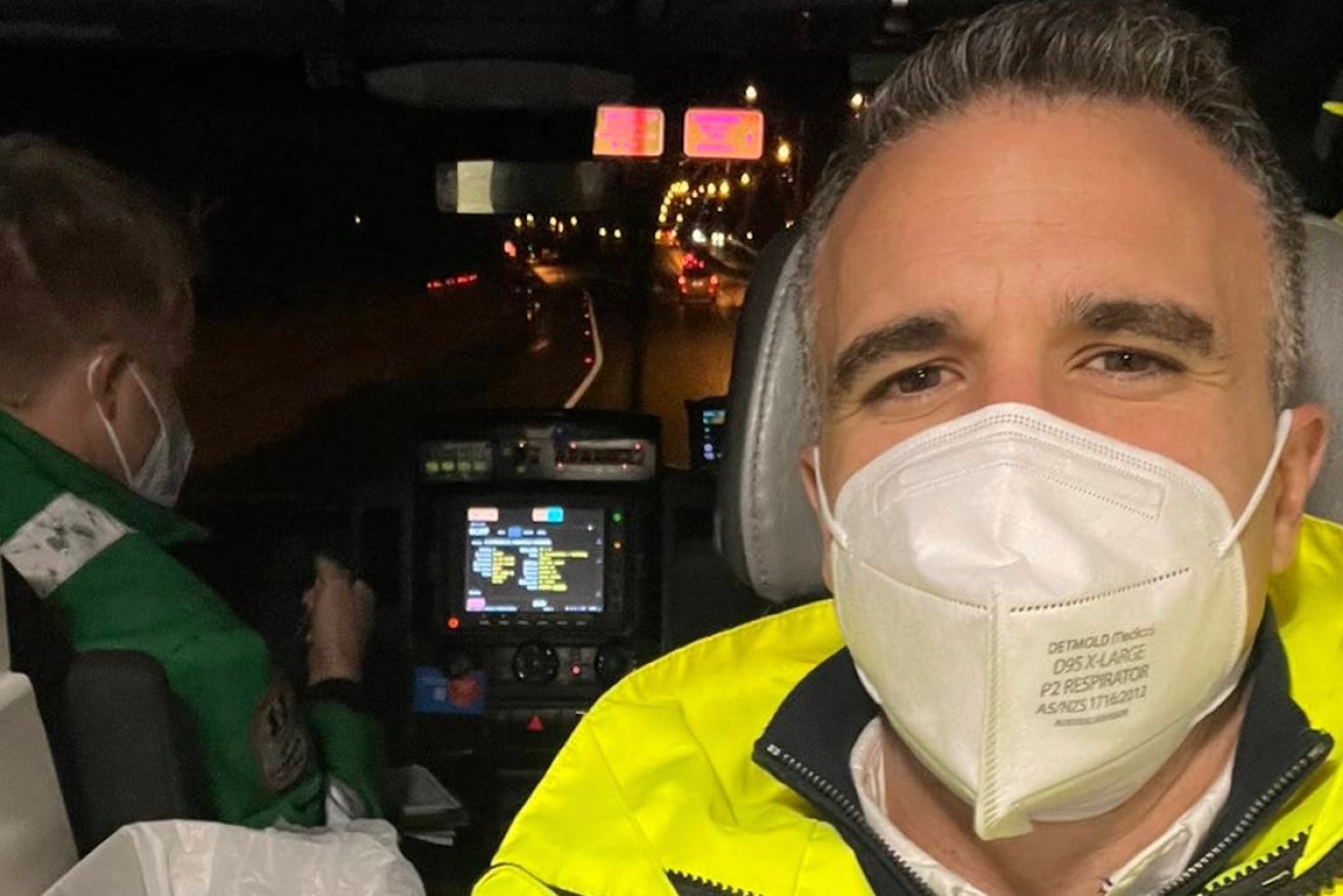 Peter Malinauskas posted a photograph of himself riding in an ambulance on the weekend. Photo: Facebook