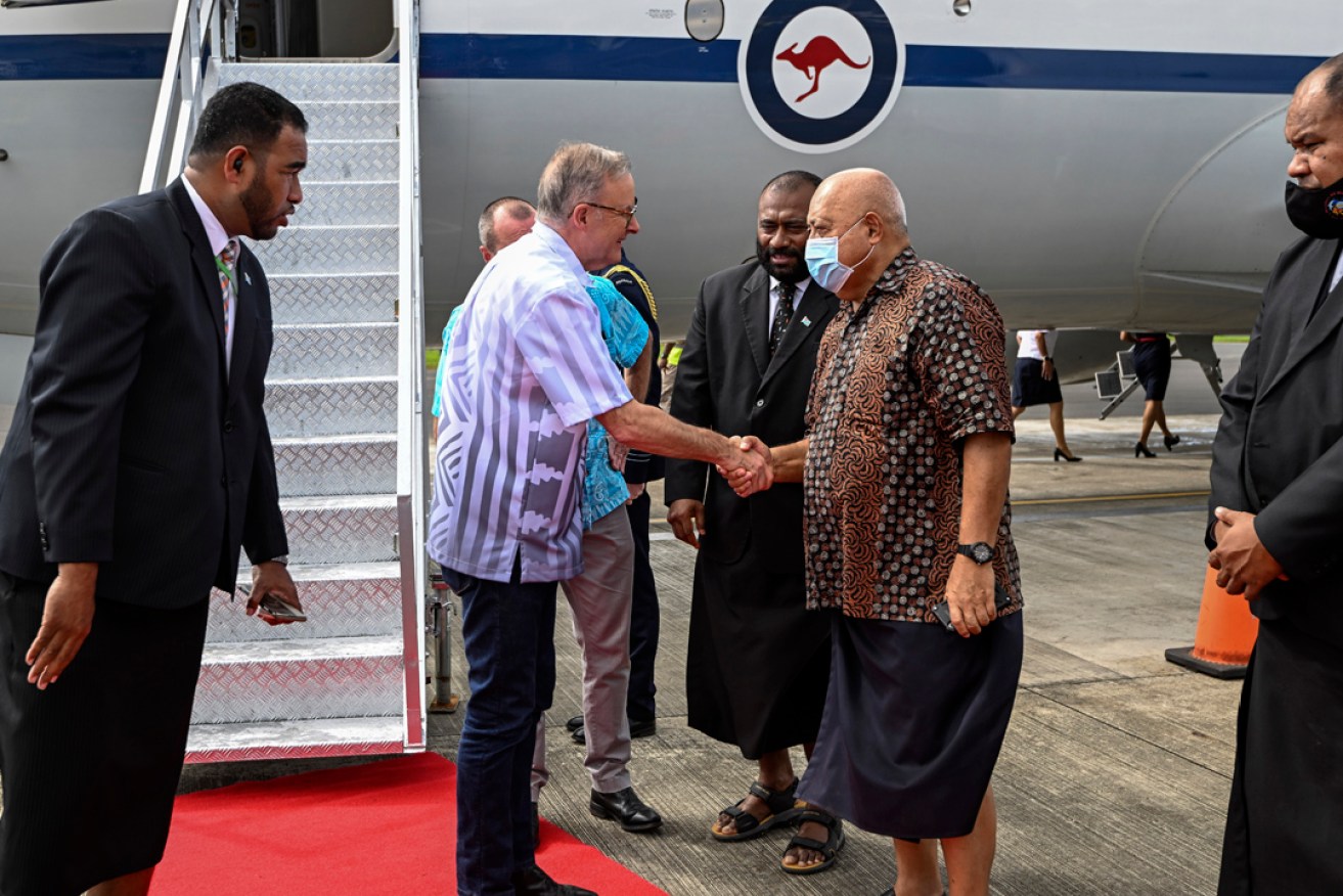 Australian Prime Minister Anthony Albanese meets Fijian diplomats on arrival in Suva for the Pacific Islands Forum. Photo: Joe Armao/AP