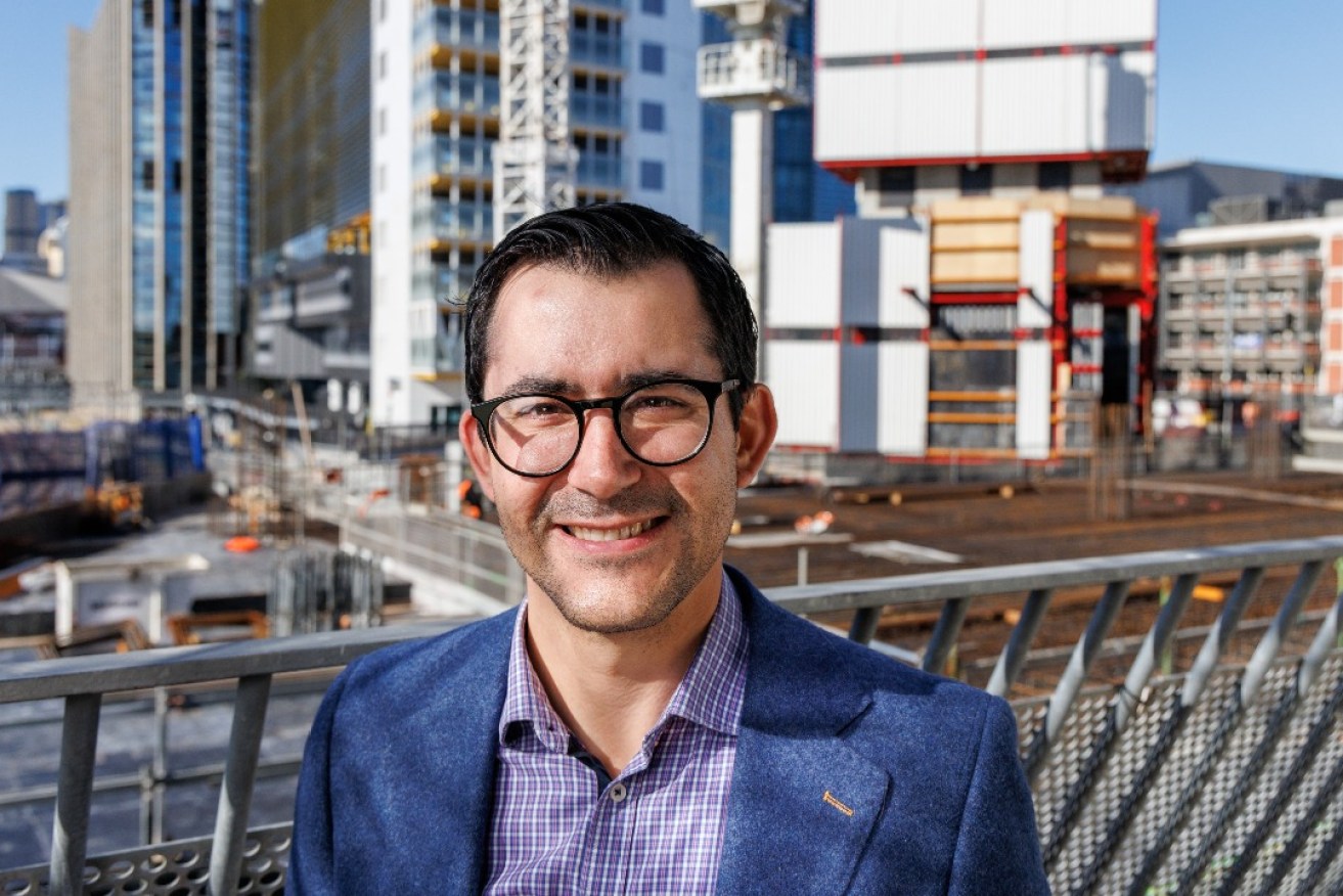 Medical physicist Dr Alexandre Santos in front of what will be Australia’s first proton therapy centre next door to SAHMRI. Photo: Tony Lewis