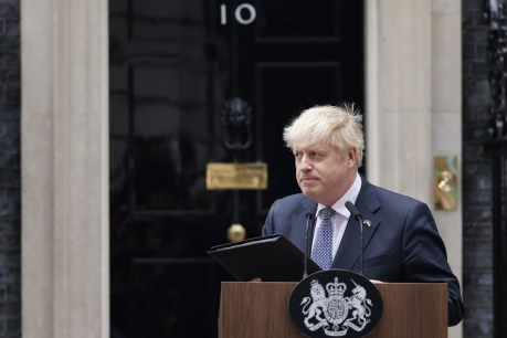 Johnson quits but will stay on as UK PM for now