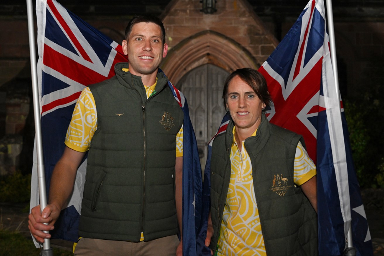 Australian Team flag-bearers Rachel Grinham (right) and Eddie Ockenden ahead of tonight's Commonwealth Games Opening Ceremony in Birmingham. Photo: Dean Lewins/AAP 