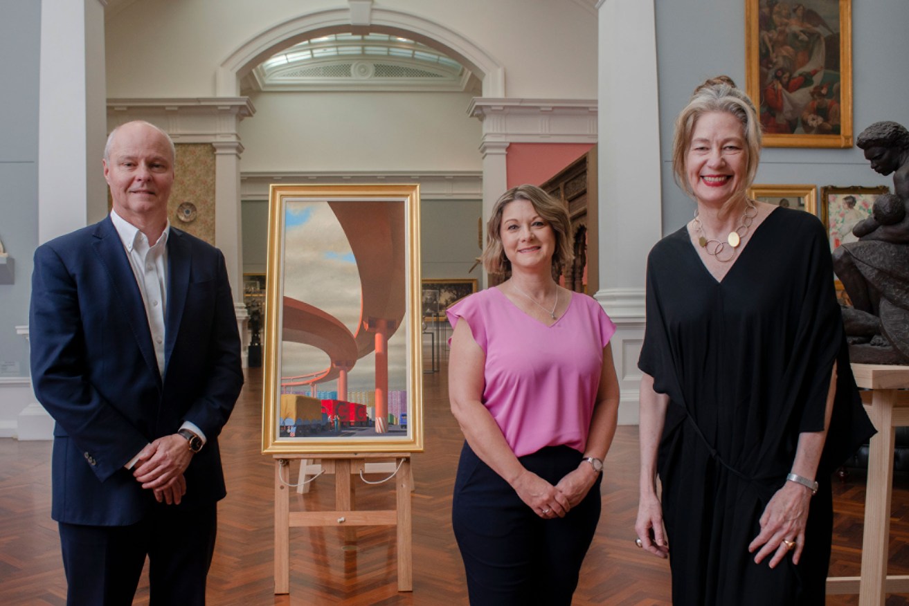 Nick Ross and Kerry de Lorme from the James and Diana Ramsay Foundation with AGSA director Rhana Devenport and the newly acquired Jeffrey Smart painting. 'The Argument, Prenestina'. Photo: Nat Rogers