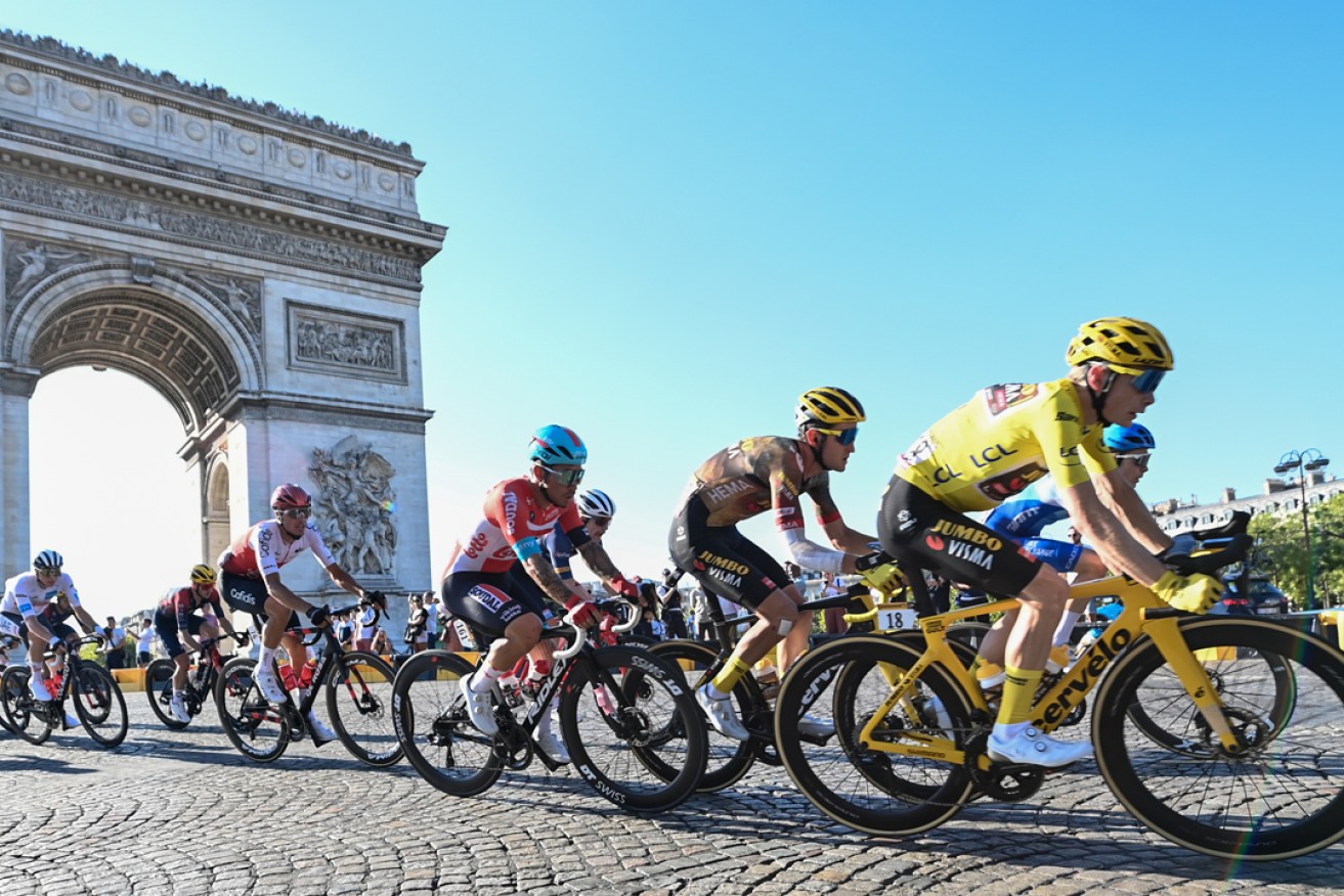 Australia's Caleb Ewan tucked on the wheel of Yellow Jersey Jonas Vingegaard as the riders enter central Paris on the final stage of the 2022 Tour de France. Photo: Pete Goding/Godingimages/PA.