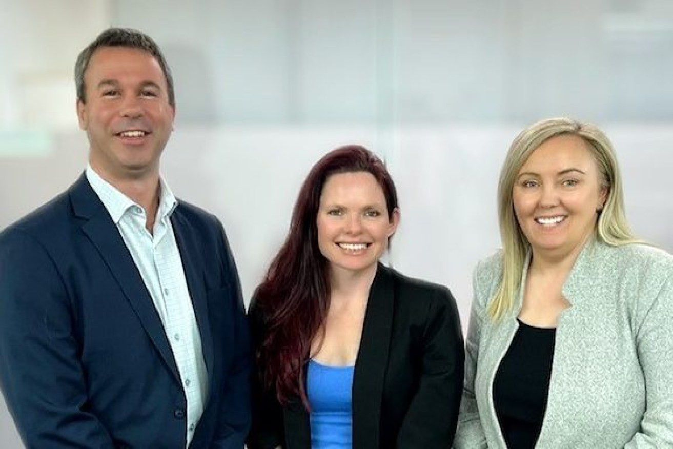 Micheal Rapisarda (left) has joined wife Paula Rapisarda (right) at MGA Insurance Group. Morgan Stuckey (centre) has also earned a promotion to Portfolio Manager. Photo: supplied