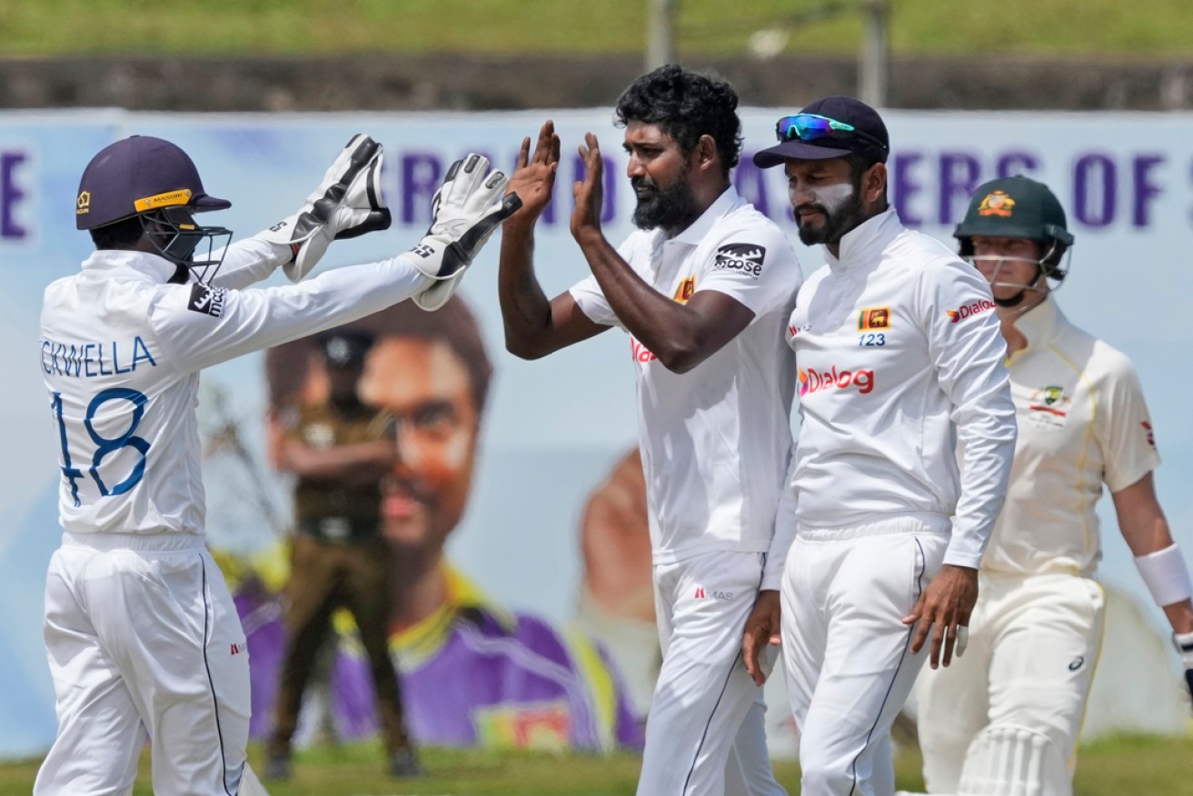 Sri Lankan spinner Prabath Jayasuriya became just the fifth bowler in history to take 12 wickets on debut as Australia capitulated in Galle. Photo: Eranga Jayawardena/AP