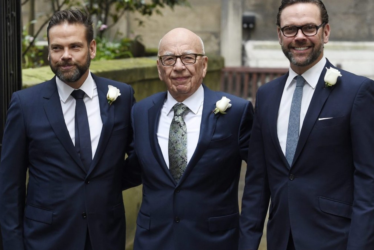 Lachlan Murdoch (left) with father Rupert and brother James. Photo: EPA/FACUNDO ARRIZABALAGA