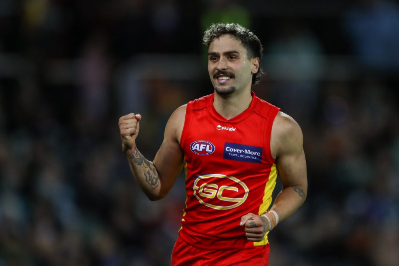 Izak Rankine celebrating a goal at Adelaide Oval earlier this year. The South Australian draftee has indicated his desire to move home next season Photo: Matt Turner/AAP 