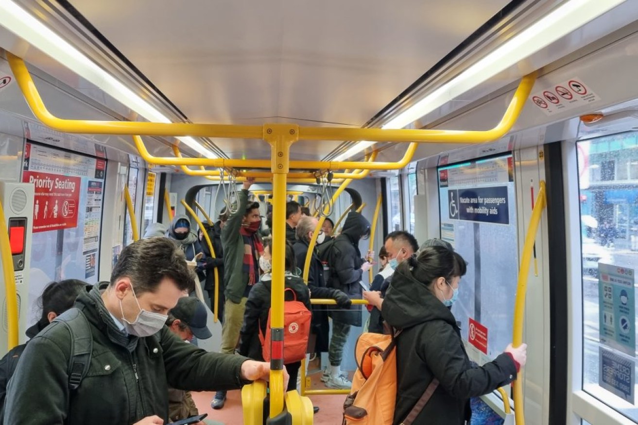 SA Health compliance officers will soon be handing out masks on public transport. Photo: Thomas Kelsall/InDaily