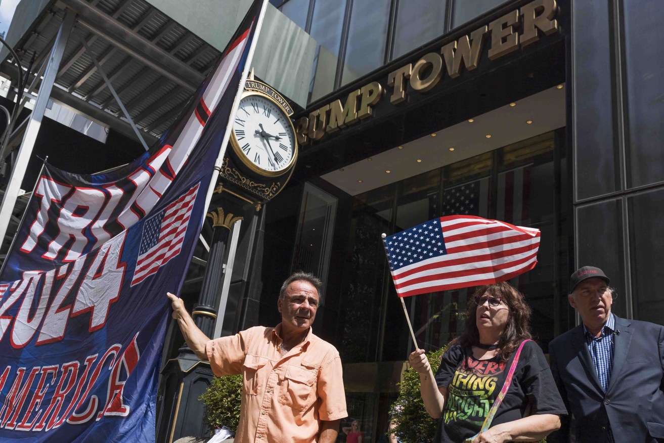 Supporters of former US President Donald Trump outside Trump Tower in New York following news of the FBI raid. Photo: EPA/Justin Lane