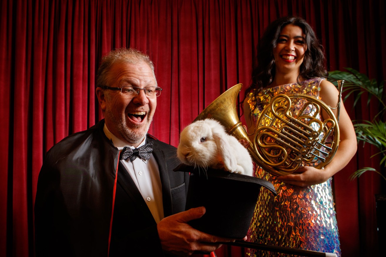 Conductor Guy Noble and French horn player Emma Gregan (pictured with Stanley the rabbit) will work magic with the ASO in 2023. Photo: Matt Turner