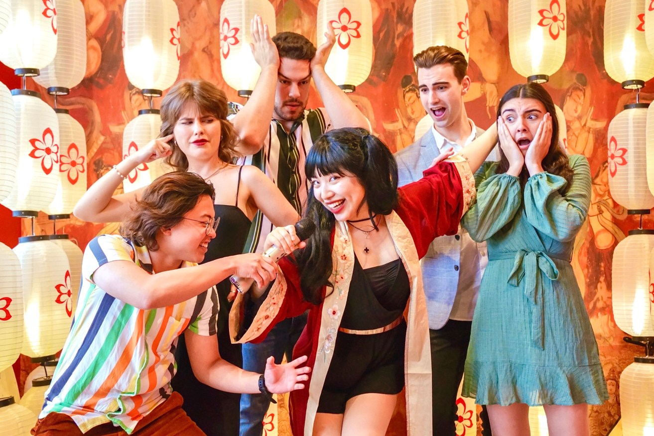 Kira Yang (centre) with Aiden Wang, Darcy Mae, Sasha Simić, Sean Jackson and Jemmah Rattley in a promotional photo for 'Not Your Average Asian Girl'. Photo: Flashing Light Photography Studio