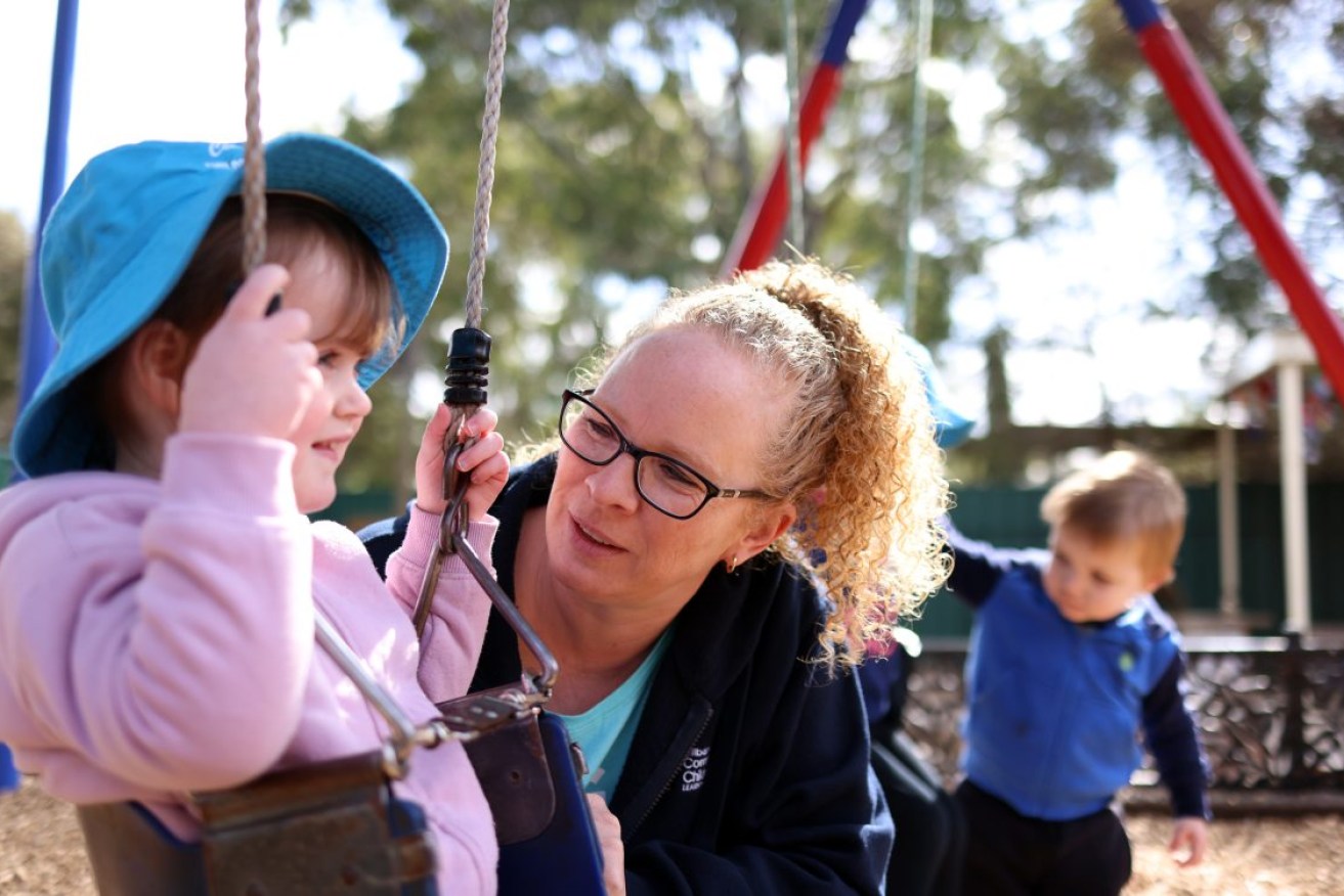 Early childhood educator Rebecca Stiles with Addalyn. Photo: Tony Lewis/InDaily