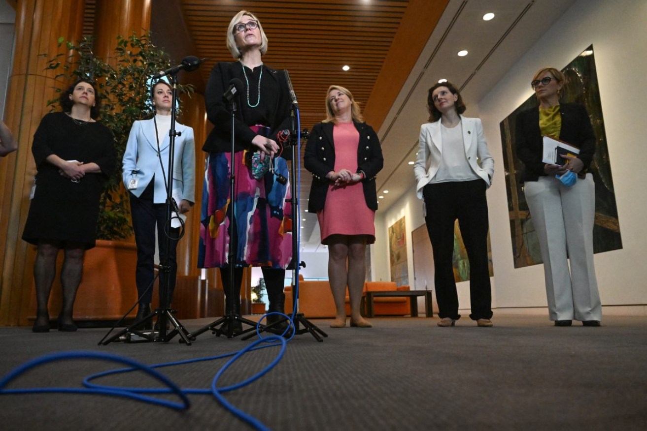 "Teal" independents Monique Ryan, Sophie Scamps, Zali Steggall, Kylea Tink, Allegra Spender and Zoe Daniel at a press conference at Parliament House in Canberra. Photo: AAP/Mick Tsikas