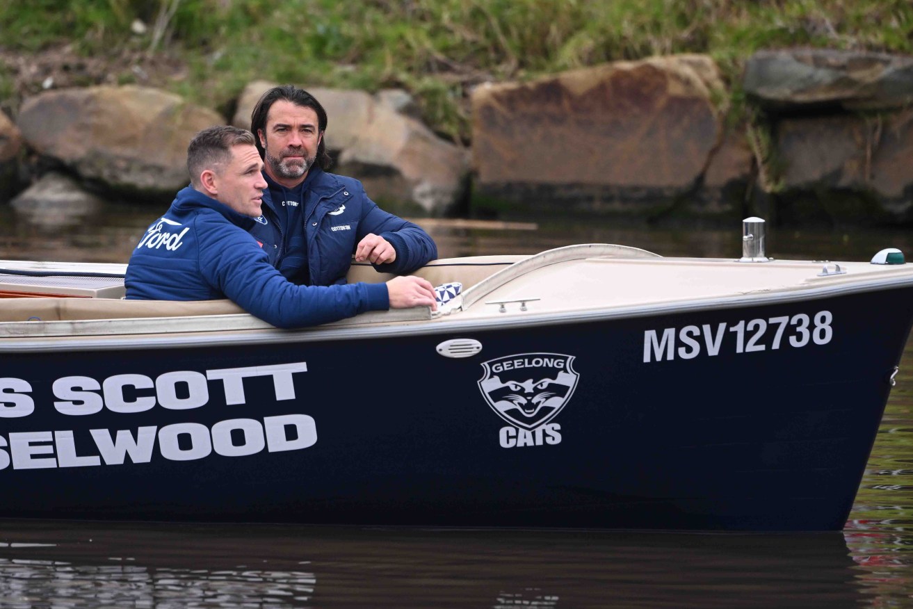 Geelong captain Joel Selwood and coach Chris Scott during the AFL Grand Final Parade in Melbourne today, which had both teams float down the Yarra River. Photo: AAP/James Ross