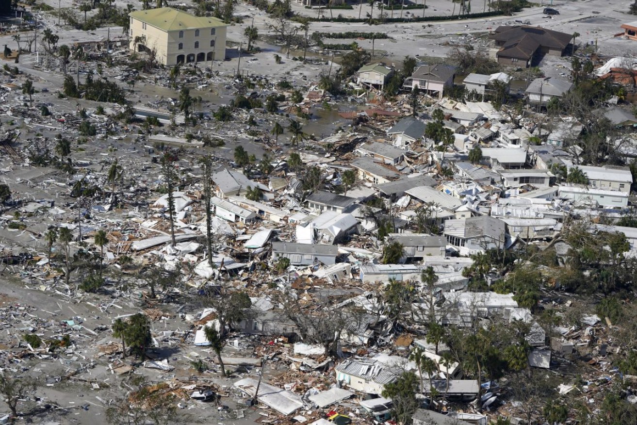 Damaged homes and debris are shown in the aftermath of Hurricane Ian at Fort Myers Beach, Florida. Photo: AP/Wilfredo Lee