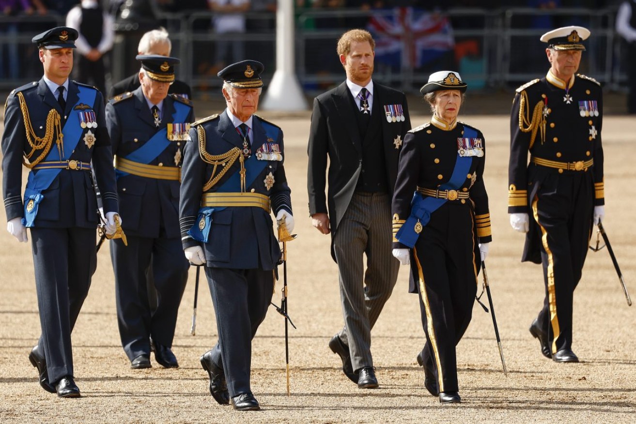 From left, Prince William, the Duke of Gloucester, King Charles III, Prince Harry, Princess Anne and Timothy Laurence follow the coffin of Queen Elizabeth II from Buckingham Palace to Westminster Hall. The Queen will lie in state in Westminster Hall for four full days before her funeral on Monday. Photo:Jeff J Mitchell/AP