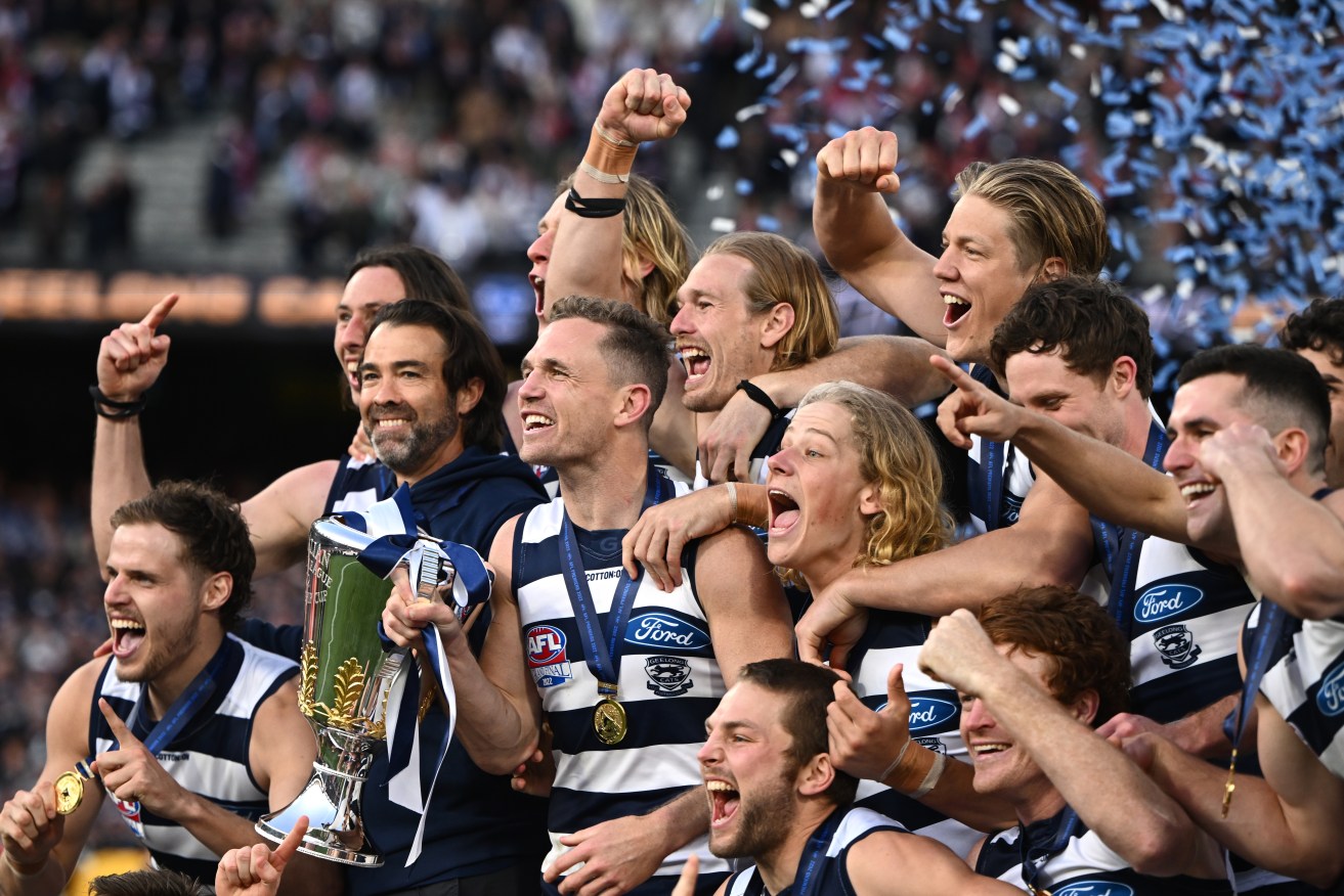 Geelong captain Joel Selwood and his team celebrate with the Premiership Cup. Photo: AAP/Joel Carrett
