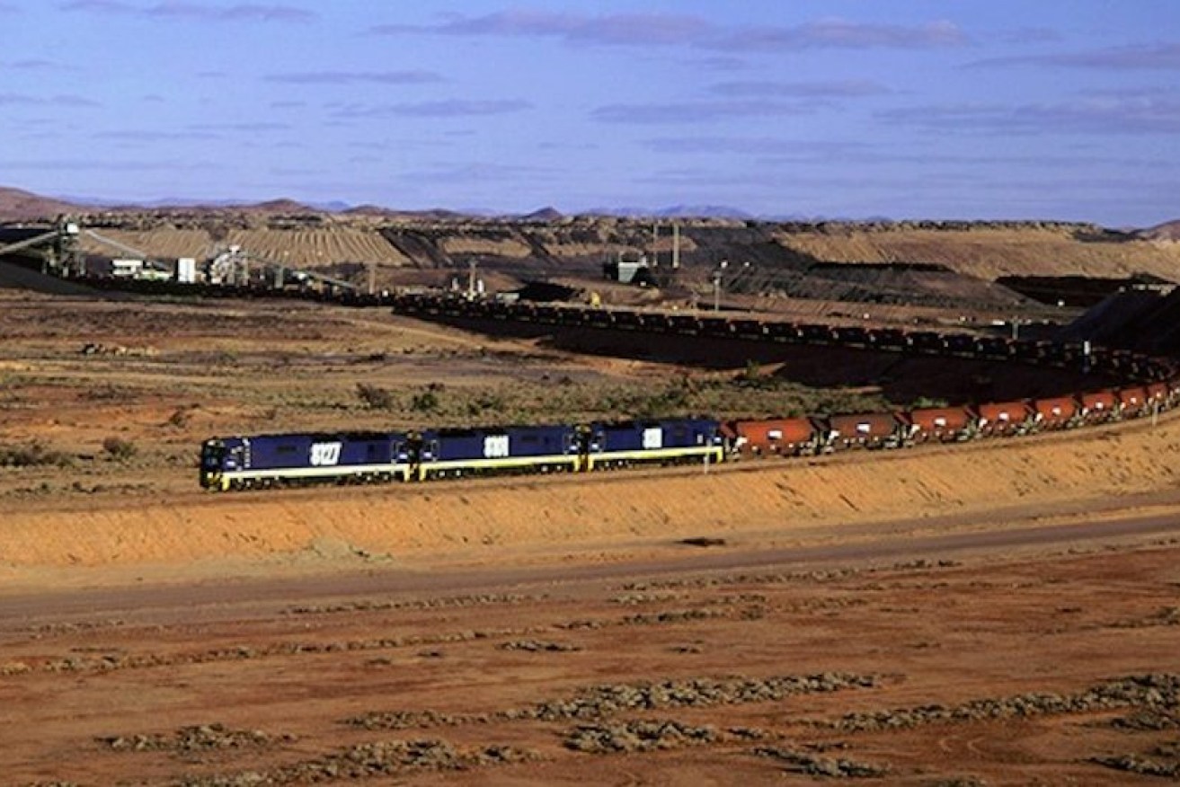 A three-engine coal train running along the Leigh Creek to Port Augusta rail line before it was decommissioned in 2016. Photo: Flinders Power