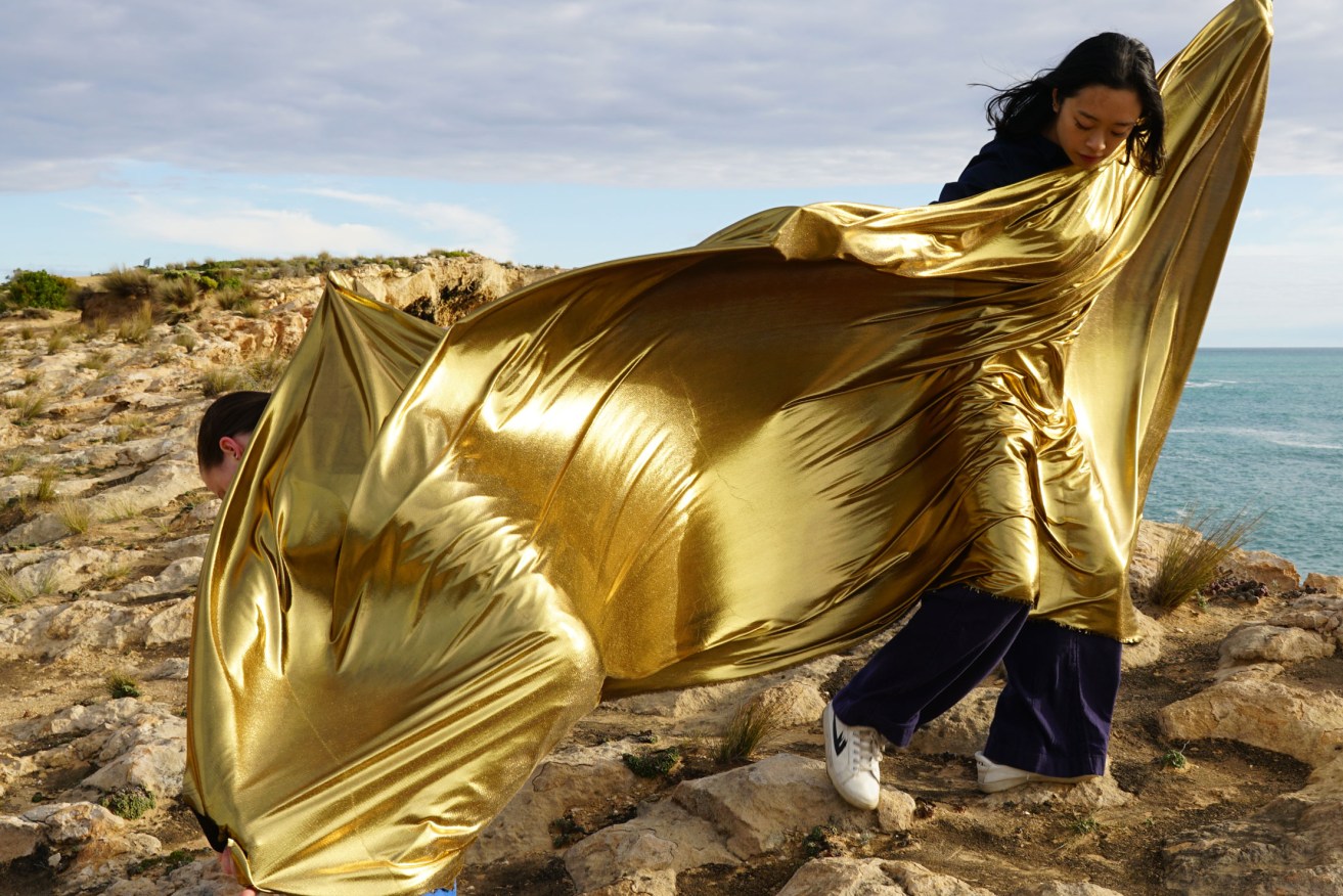 Dancers Tayla Hoadley and Queenie Wu on location for 'The Long Walk' in Robe. Photo: Sue Healey