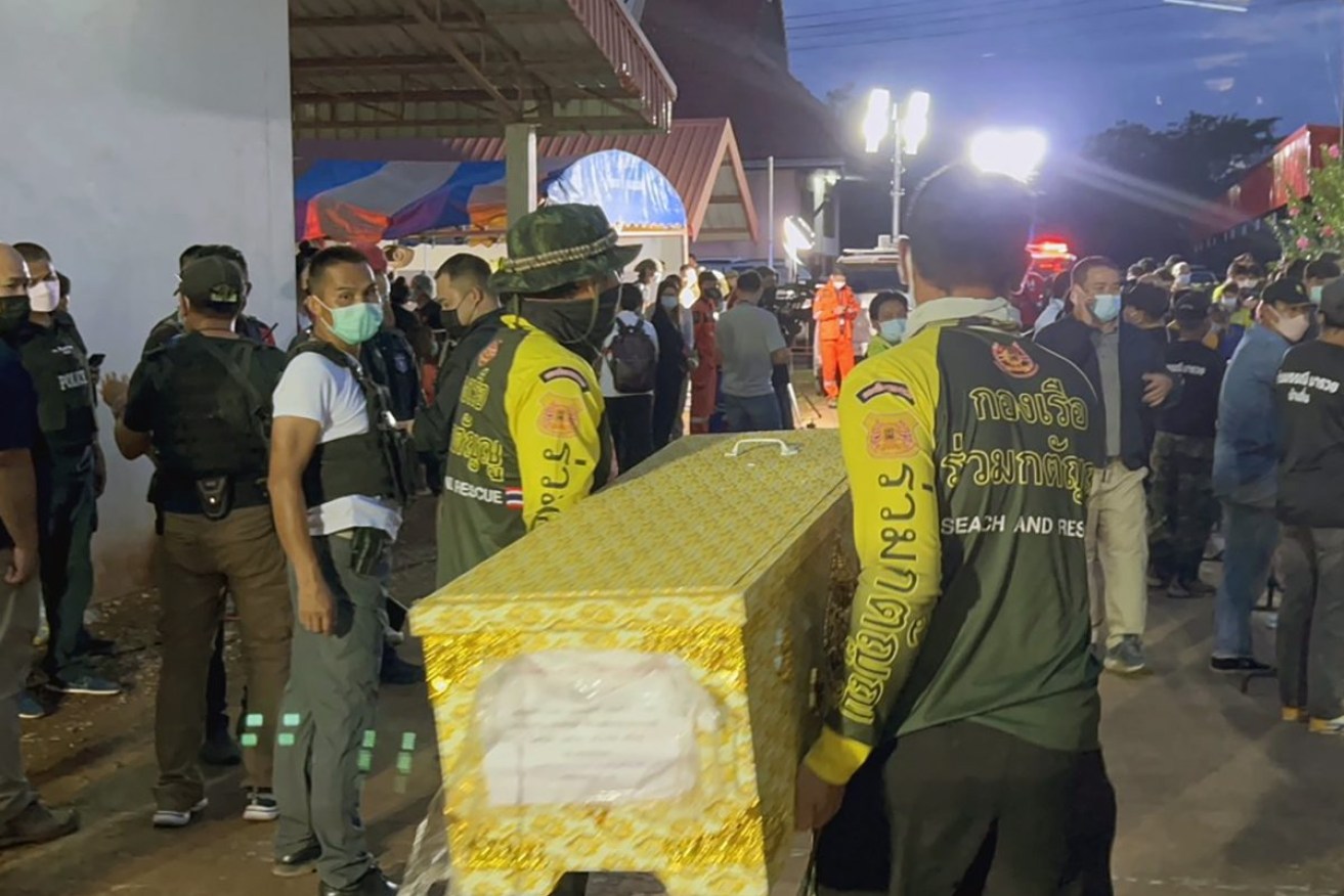 Ruamkatanyu Foundation's rescue workers carrying a coffin containing one of the victims at a childcare center in Nong Bua Lamphu province, Thailand. Photo supplied by EPA/Ruamkatanyu Foundation.
