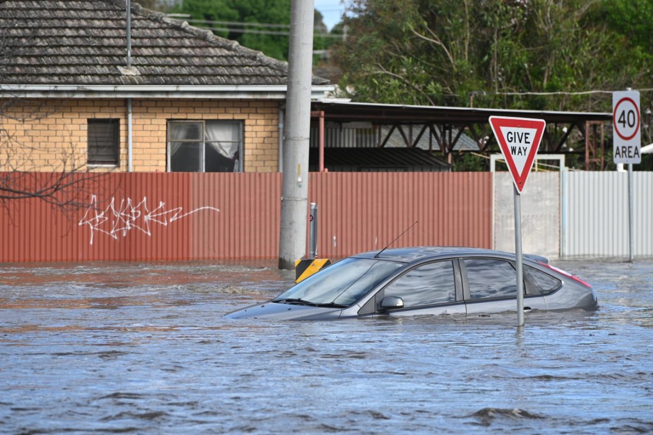 A submerged car in Melbourne's inner west Maribyrnong on Friday morning. Photo: AAP/Erik Anderson
