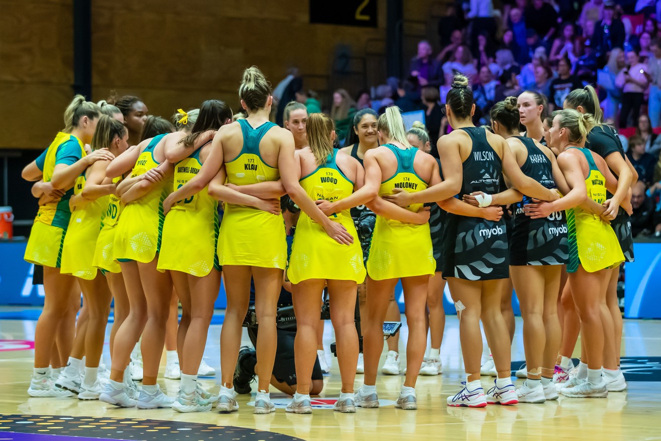 Teams huddle after the Constellation Cup netball match between the New Zealand Silver Ferns and the Australian Diamonds in Mount Maunganui, New Zealand on Sunday. Photo: AAP/Aaron Gillions.