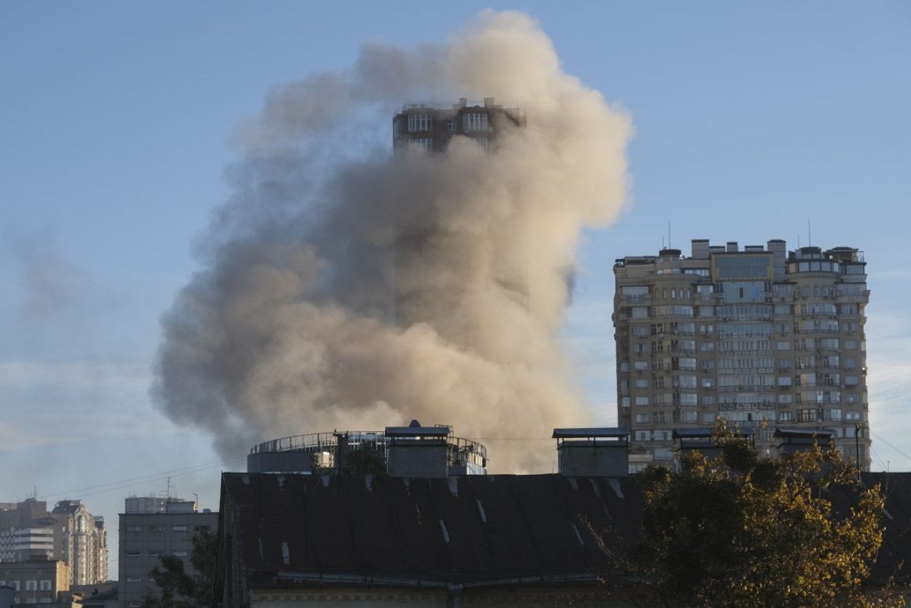 Smoke billows from a building hit by a drone attack in downtown Kyiv. Photo: EPA/Vadym Sarakhan