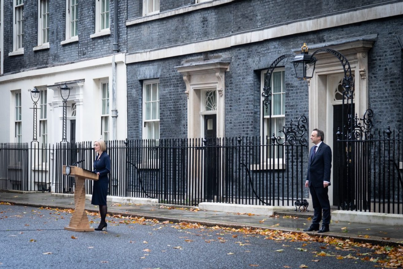 Prime Minister Liz Truss with her husband Hugh O'Leary, makes a statement outside 10 Downing Street, London, where she announced her resignation after just 44 days. Photo: Stefan Rousseau/PA Wire