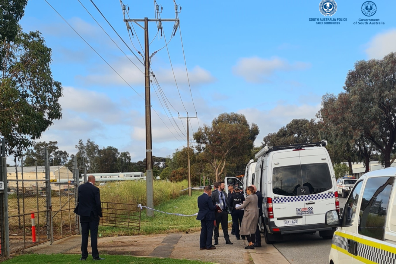 Police at Cheviot Road, Salisbury South where the decomposed remains were discovered. Photo: SA Police.