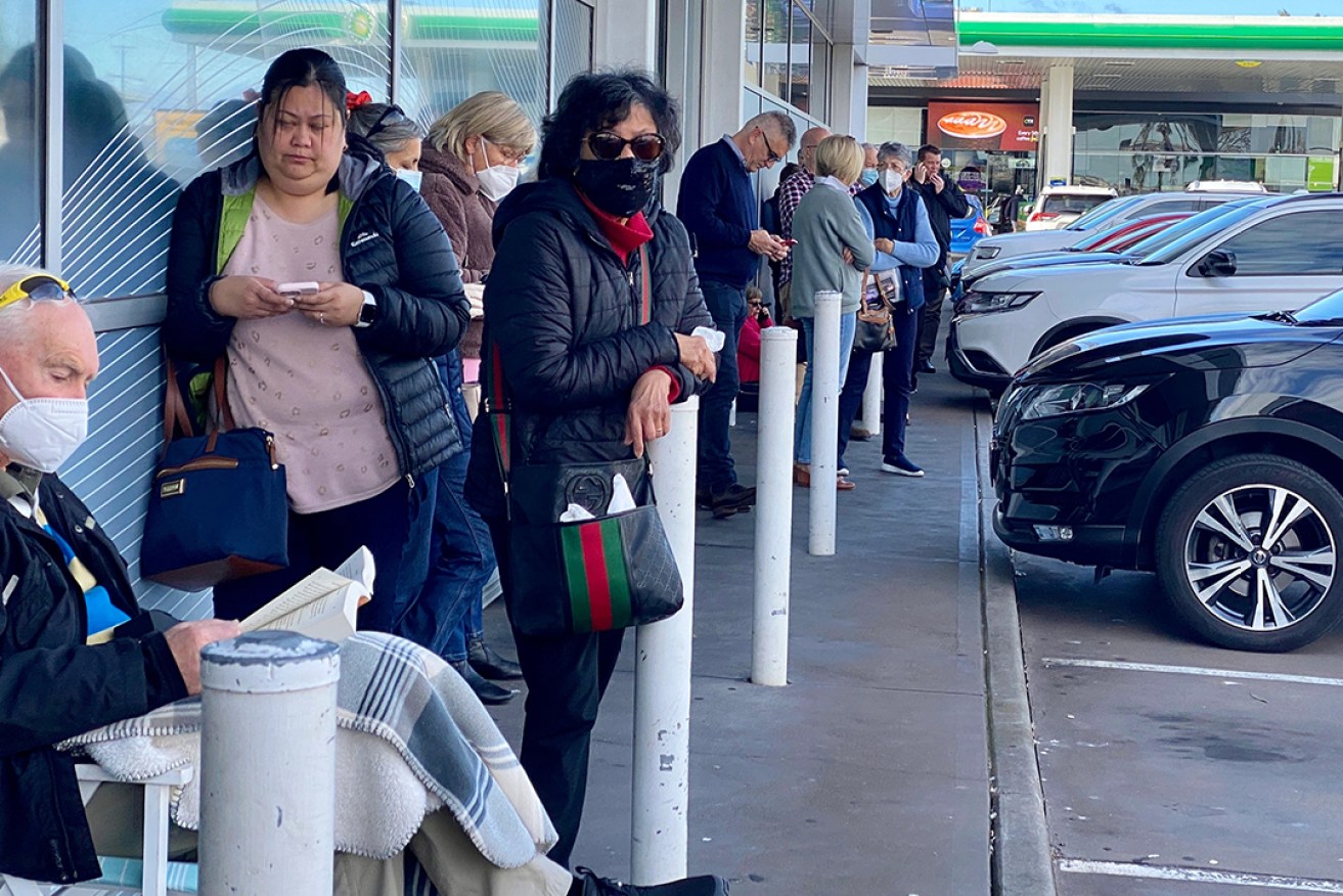 Optus customers queue outside Service SA's Tranmere office to replace their driver's licence after the hack. Photo: Tony Lewis/InDaily