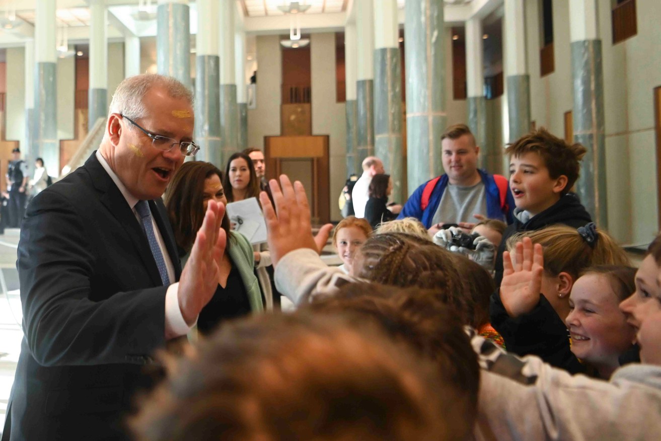 Then Prime Minister Scott Morrison speaks to school students visiting Parliament House in Canberra in 2019.  Photo: AAP/Lukas Coch