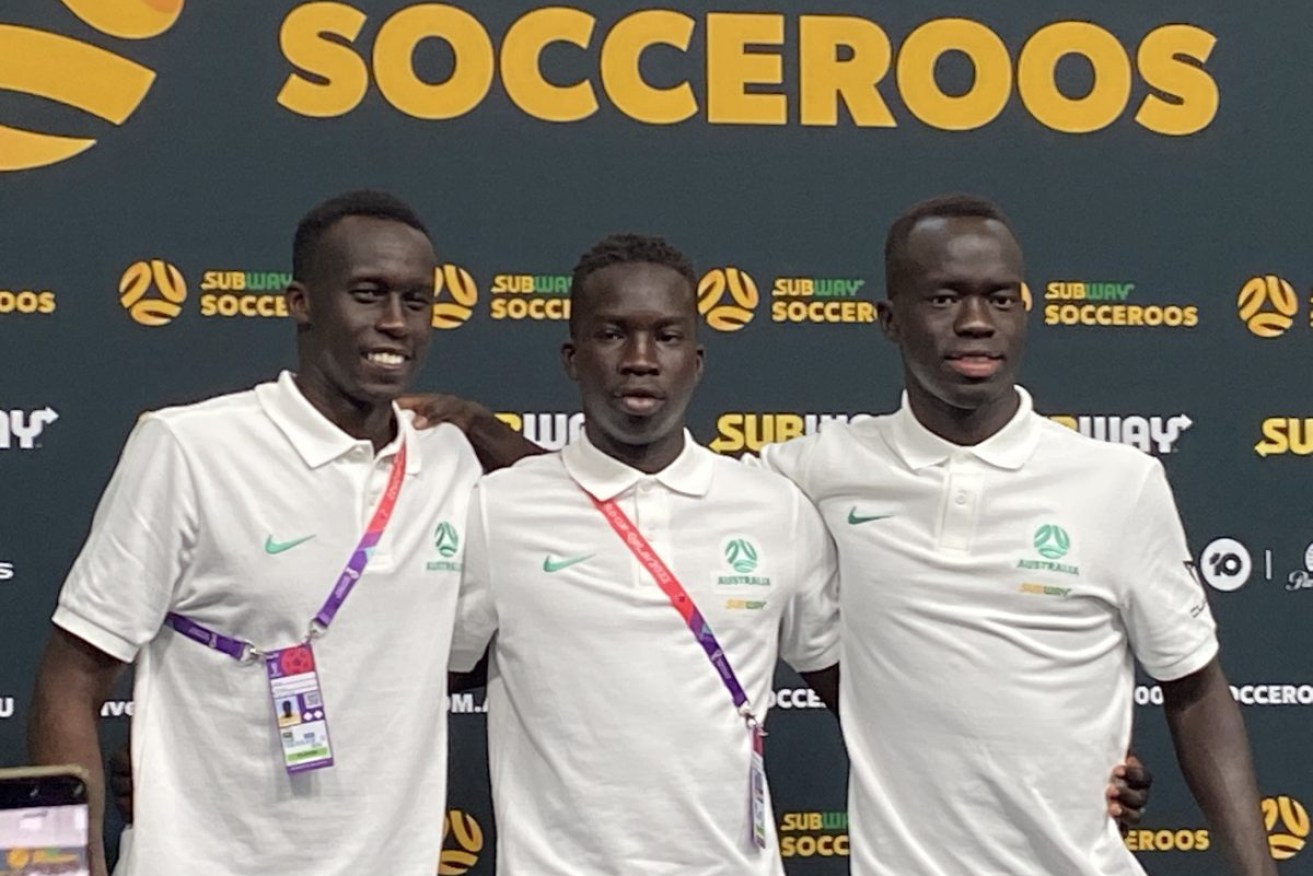 Socceroos Thomas Deng, Garang Kuol and Awer Mabil in Qatar on Friday. Photo: AAP/Steve Larkin