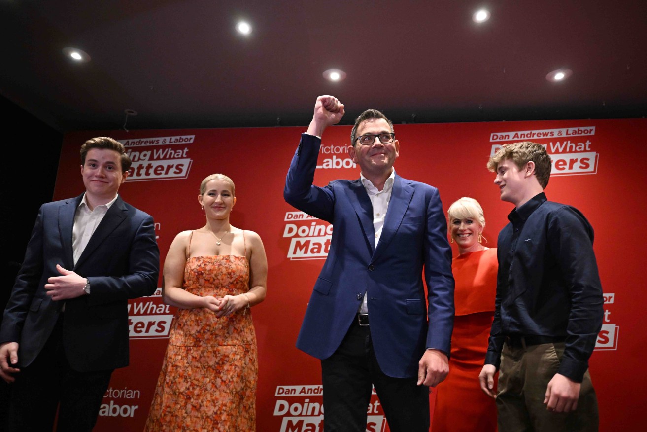 Dan Andrews celebrates his victory on Saturday night, surrounded by his family. Photo: AAP/James Ross
