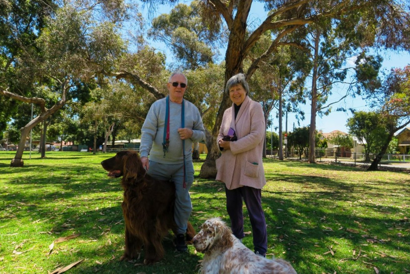 Hugh and Ros Baddams with their dogs Edward and Thomas. Picture: Jason Katsaras/InDaily