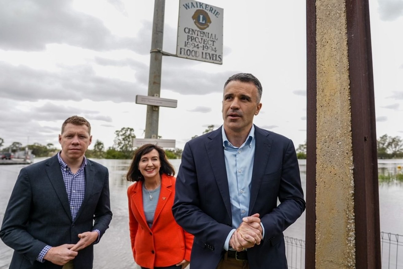 Premier Peter Malinauskas with Ministers Susan Close and Joe Szakas at the Waikerie ferry. Photo: Supplied.
